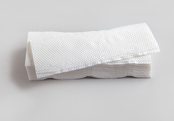 stack of new white folded towels