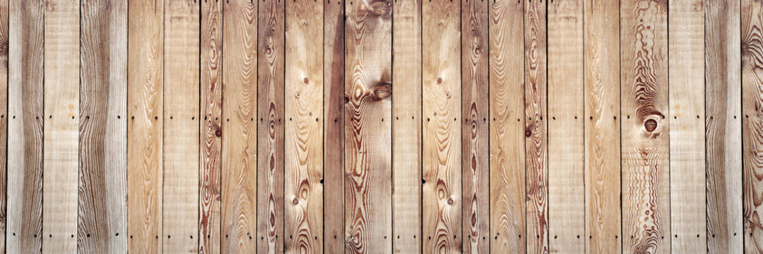 old raw boards in fir tree nailed and forming a panoramic wooden background