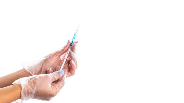 Vaccine isolated. Doctor hand in medical glove hold syringe with needle for protection flu virus and coronavirus. Covid vaccine isolated on white. Disease care hospital prevention.