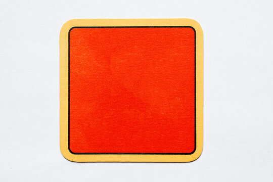 Old used coaster or bottle pad. For beer or other drinks, isolated. Add your own design, message or logo.
