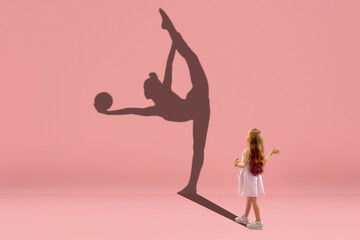 Childhood and dream about big and famous future. Conceptual image with girl and drawned shadow of...