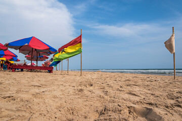 A beach without tourists and with flags from different countries Accra Ghana West Africa