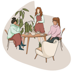 Friendly girls talking in cafe