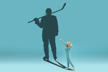 Childhood and dream about big and famous future. Conceptual image with boy and shadow of sportive male hockey player, champion on blue background. Childhood, dreams, imagination, education concept.