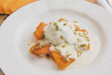 ice cream with caramelized pumpkin and pumpkin seeds