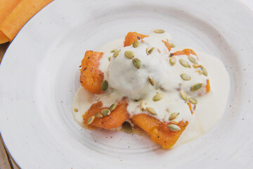 ice cream with caramelized pumpkin and pumpkin seeds