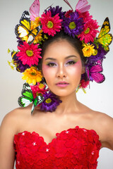 Beautiful Asian woman in red dress