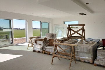 Interior of a house with big room under renovation works.