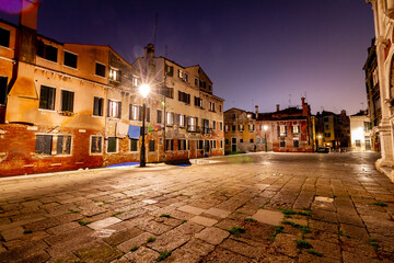 Night view of canal in Venice, Italy. Architecture and landmarks of Venice. Night life of Venice. Venice postcard with night canal. 