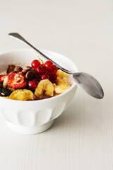 M&uuml;slisch&uuml;ssel mit L&ouml;ffel