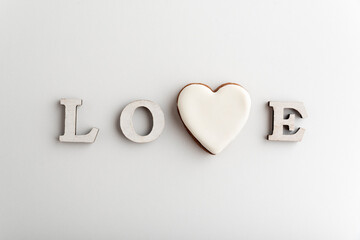 White lettering LOVE with heart instead of letter V. Valentines Day