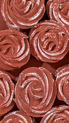 Delicate zephyr sprinkled with cocoa powder. Low-calorie marshmallows. Homemade dessert.
