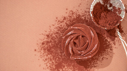 Delicate zephyr sprinkled with cocoa powder. Low-calorie marshmallows. Homemade dessert.