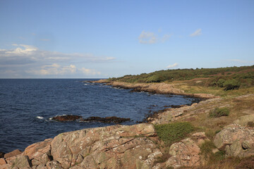 Naklejka premium coast on the island of Bornholm in the Baltic Sea, traveling around Europe, Holidays on the island, amazing places in Europe
