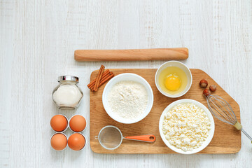 Composition with baking ingredients and cooking utensils top view
