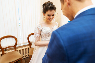 Naklejka premium putting a ring on your finger at a wedding, an oath of eternal love of the bride and groom, a festive ceremony of registering the marriage of people in love