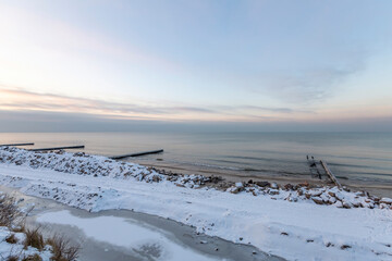 Winter seascape with Baltic Sea waters, horizon and cloudy sky in Kaliningrad region, Russia