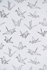 Origami de grue en motif noir et blanc sur papier - Arrière plan design graphique