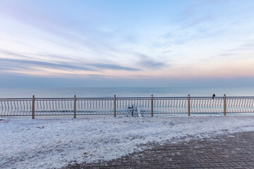 Winter seascape with Baltic Sea waters, horizon and cloudy sky in Kaliningrad region, Russia