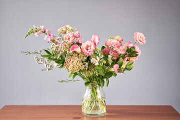 Bouquet 001. Finished flower arrangement in a vase for home. Flowers bunch, set for interior. Fresh cut flowers for decoration home. European floral shop. Delivery fresh cut flower.
