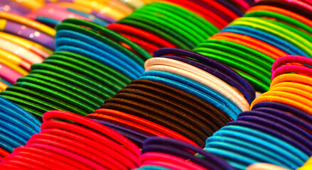 stack of colourful bracelets unique photo