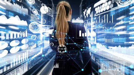 Imaginative visual of business woman investment specialist and advisor with business data chart graphic overlay .