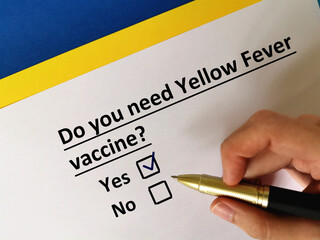 One person is answering question about vaccines. He needs yellow fever vaccine.
