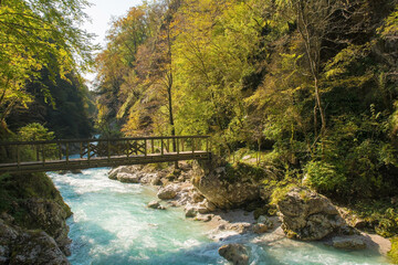 Fototapeta na wymiar The lower Devil's Bridge crossing the Tolminka River which flows through Tolmin Gorge in the Triglav National Park, north western Slovenia 