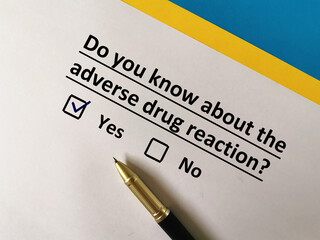 One person is answering question about vaccines. He knows about adverse drug reaction.