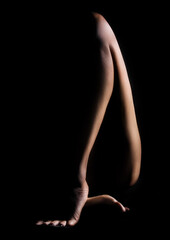 Silhouette of female legs dark art photography