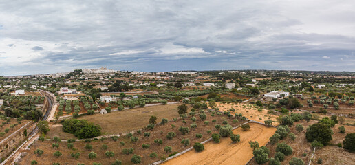 View of Locorotondo in Apulia from the air with a cloudy sky