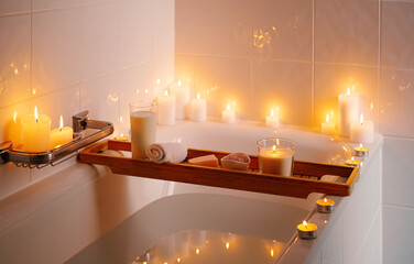 Spiritual aura cleansing ritual bath for full moon ritual with candles, aroma salt and milk.