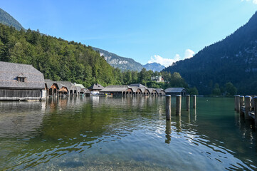 Fototapeta premium Old boats houses in Schoenau at lake Koenigssee