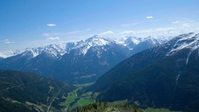 Long pan across Austrian mountain scenery
