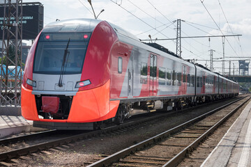 Modern electric train stops at the station