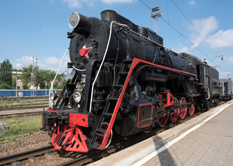 The locomotive of the last century standing under steam