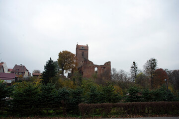 Fototapeta na wymiar Gerdauen Castle in the Kaliningrad region, the medieval central gate in the autumn season.