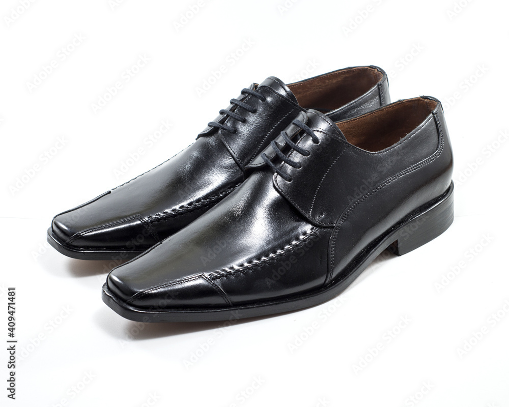 Sticker Pair of black leather men shoes isolated on white background