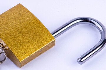 open padlock with key on white