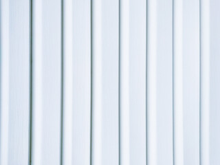 Obraz premium White vinyl wood siding panel background with imitation wood texture.