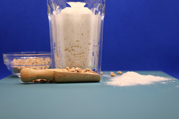 Wheat natural leaven for bread in a glass jar. The concept of a healthy diet. Sourdough starter. A...