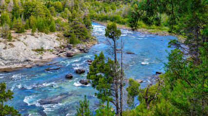 torrential river in a forest in San Martin de los Andes, Neuquen, Argentina    
