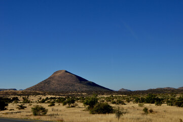 Fototapeta na wymiar Namibia: Landscape with hills in the Kalahari-semi desert in the Nord Cape