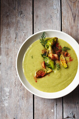 Broccoli cream soup with brussels sprouts and bacon.