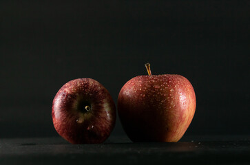 red apples on a black background