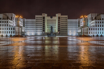 The Lenin Monument in front of the Government house at the independence square in Minsk seen at a rainy night