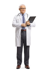 Full length portrait of a mature doctor smiling and holding a clipboard