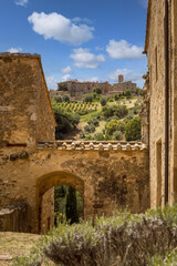 View of Castelnuovo dell'Abate from the cloister of Sant'Antimo Abbey, Tuscany, Italy