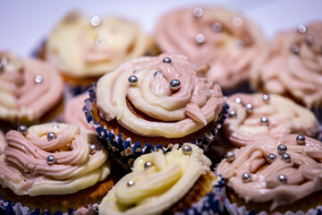 Decorated Cup Cakes Piled on a Plate