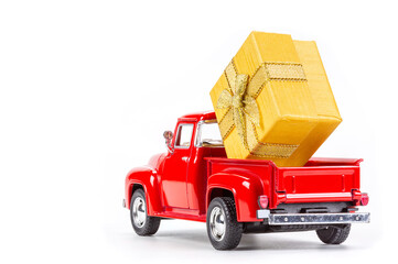 Toy pickup truck carries a gift box